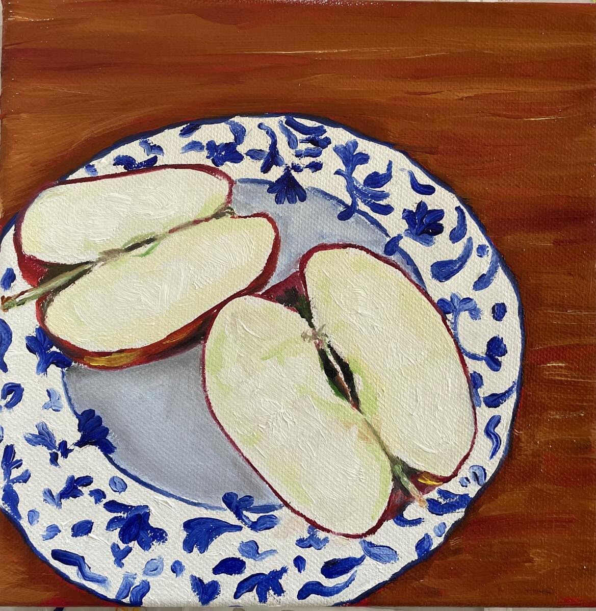 Gala Apple on blue plate